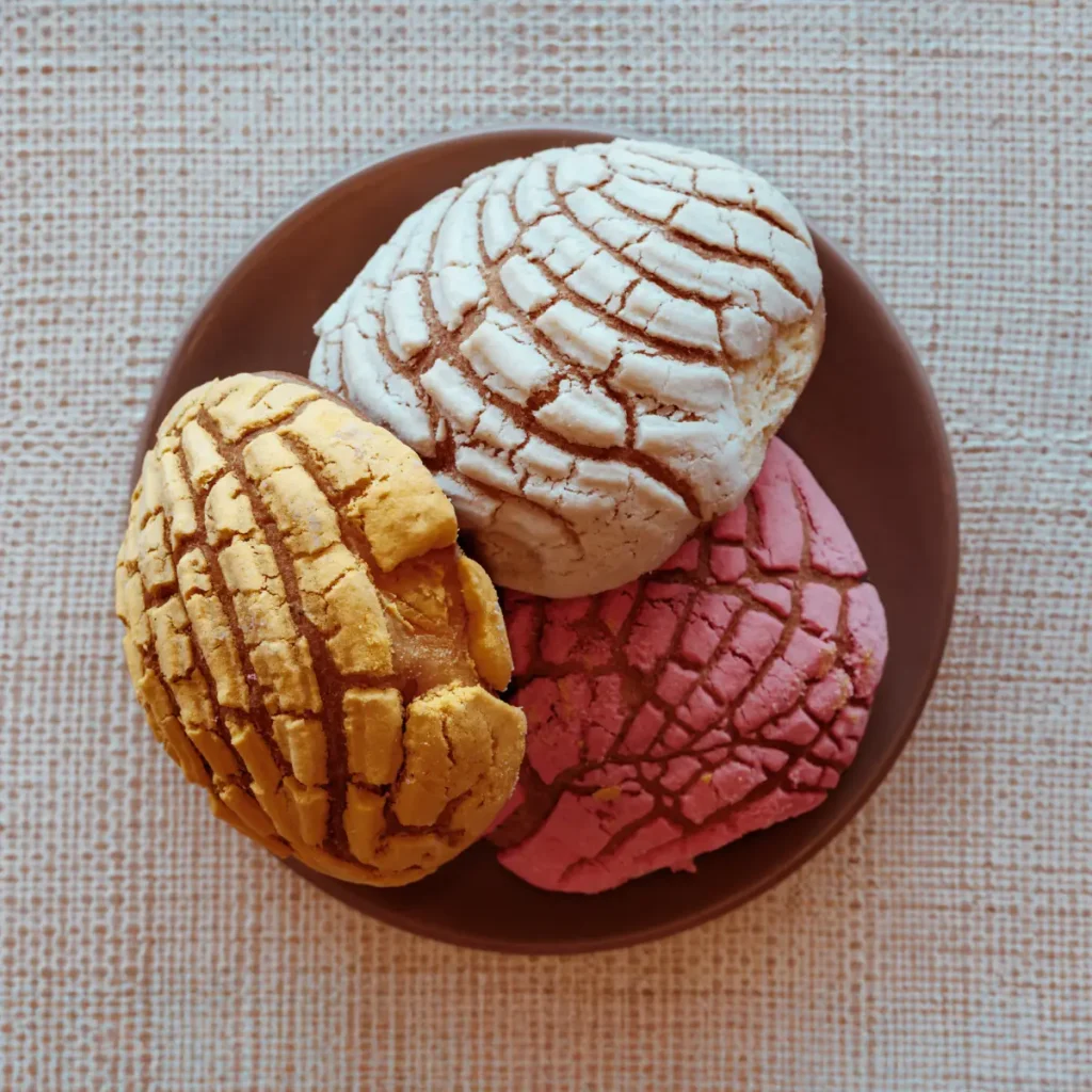 Assorted Mexican conchas or sweet bread on plate